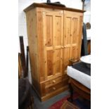 A modern waxed pine wardrobe