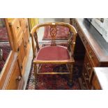 Edwardian mahogany bow backed open armchair