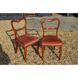 A set of six Victorian carved rosewood dining chairs