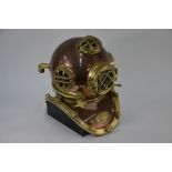 A reproduction brass and copper US Navy divers helmet