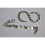 Two various silver and white metal heavy curb and square link bracelets