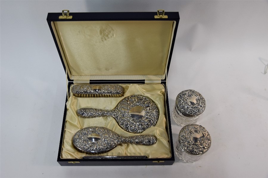 A four-piece embossed silver brush set with hand mirror, in fitted presentation case - Image 3 of 5