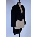 A gentleman's black tail coat by Henry Poole