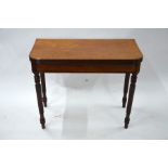 A George III mahogany card table in the manner of Gillow