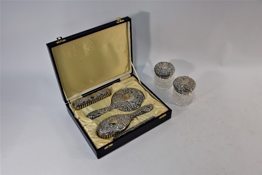 A four-piece embossed silver brush set with hand mirror, in fitted presentation case - Image 2 of 5