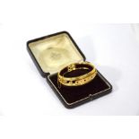 A Victorian sapphire and diamond yellow gold bangle