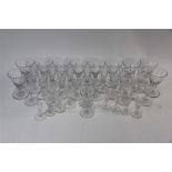 A suite of Art Deco style cut and moulded drinking glasses