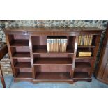 An Edwardian breakfront mahogany library open low bookcase