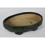 A 20th century Chinese green glazed Canton stoneware bonsai bowl/pot
