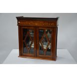 Inlaid rosewood wall cabinet in the Sheraton revival style