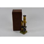A Victorian brass field microscope in teak box
