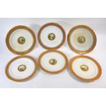 A set of six Victorian Minton china cabinet plates