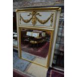A large French parcel gilt and white distress paint finished overmantel mirror