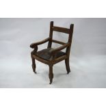 A substantial jointed oak framed antique open armchair