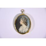 A Georgian oval portrait miniature on ivory of a lady in the manner of Richard Cosway