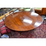A 'Jupe' style extending mahogany dining table