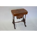 A Victorian walnut work table