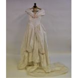 A 1990s cream silk taffeta wedding dress