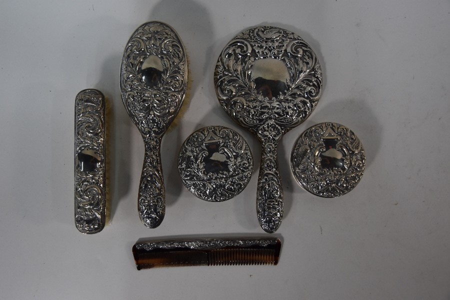 A four-piece embossed silver brush set with hand mirror, in fitted presentation case - Image 5 of 5