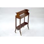 An Edwardian red walnut bookstand