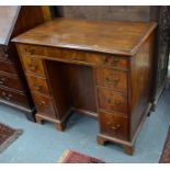 A George III mahogany kneehole desk