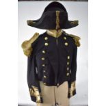 A Naval Officer's cocked hat, tail-coat and epaulettes