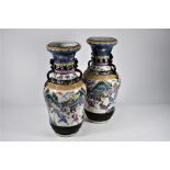 A pair of Chinese famille rose 'battle scene' vases, late Qing period, 45 cm high