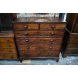 A Georgian mahogany chest of two short over 4 long graduated cross-banded drawers