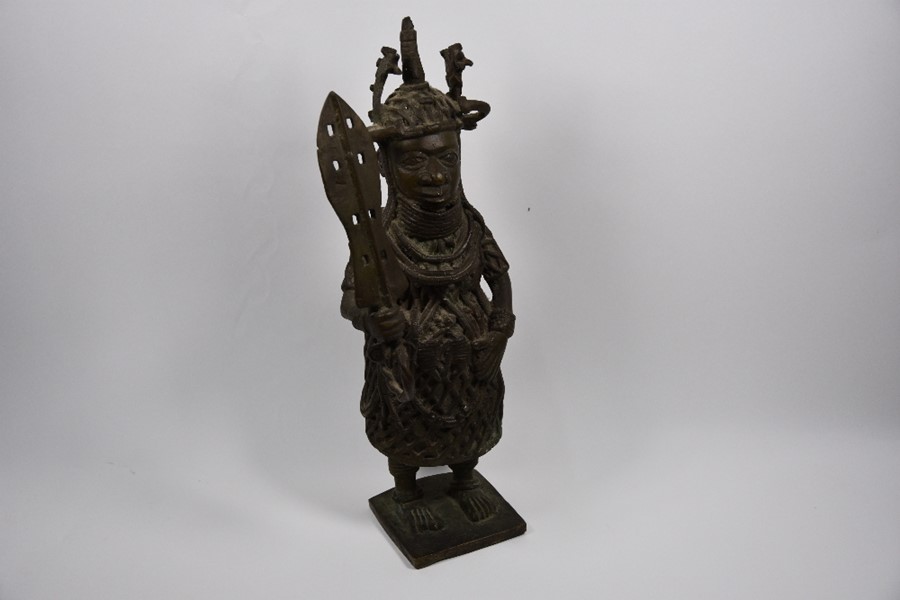 A Benin-style bronze figure of a heavily-armoured warrior