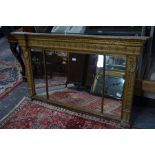 A Regency giltwood Adam style overmantel mirror
