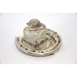 A Victorian electroplated inkstand modelled as a horseshoe