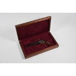 A miniature replica US Civil War period 44 calibre Army Colt