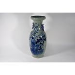 A large Chinese blue and white celadon ground baluster vase with stylised chilong handles