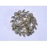 An Edwardian diamond set open circlet brooch