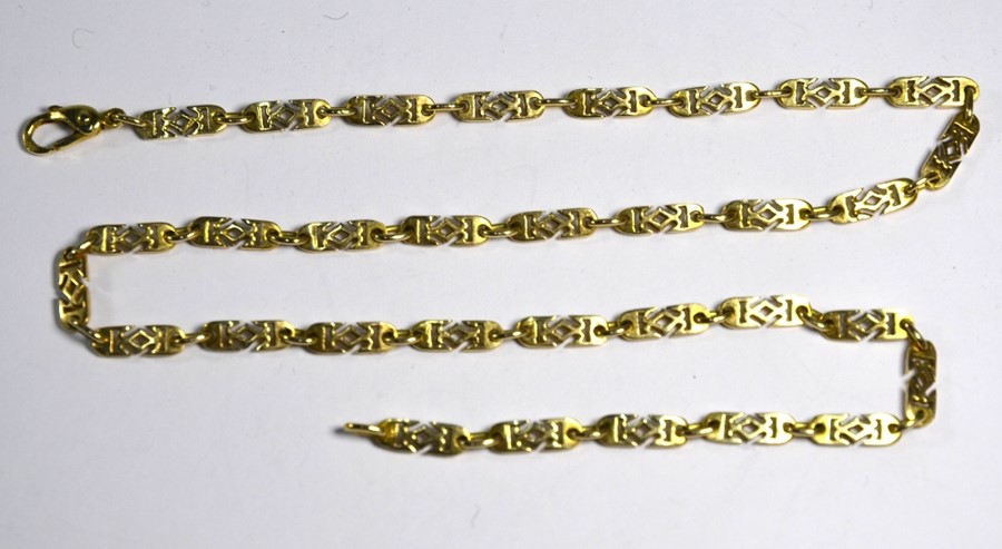 A yellow metal fancy link necklace