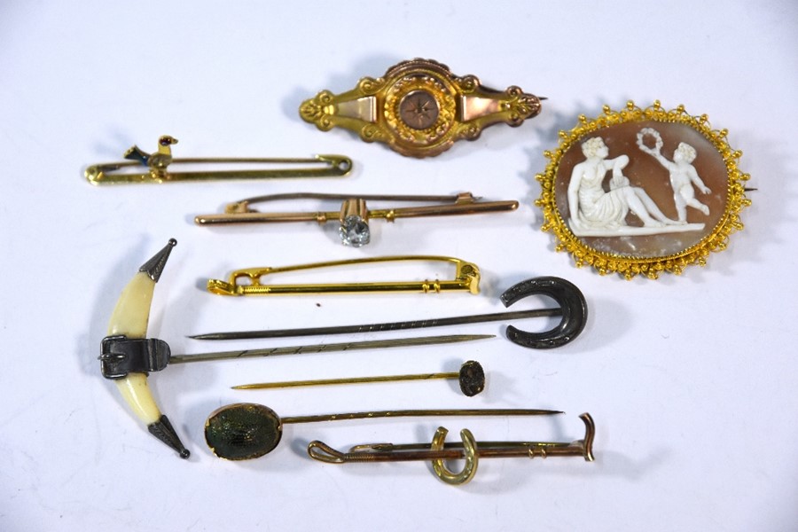 A collection of Victorian and later brooches and pins