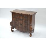 An antique continental oak three drawer commode chest