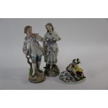 A pair of late 19th century/early 20th century German porcelain figures