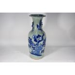 A large late 19th or early 20th century Chinese blue and white celadon ground vase