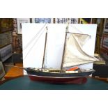 A scratch-built model of a two-masted fishing smack