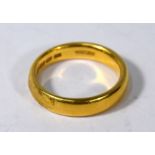 WITHDRAWN A 22ct yellow gold court style wedding band