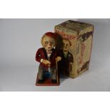 A boxed Japanese Nomura TN tinplate battery-operated figure 'Macgregor'