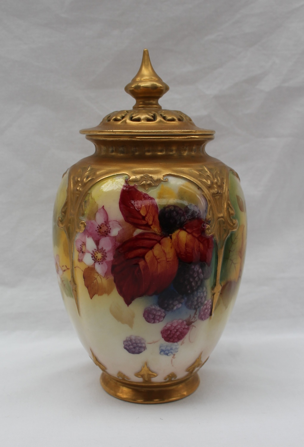 A Royal Worcester vase and cover,