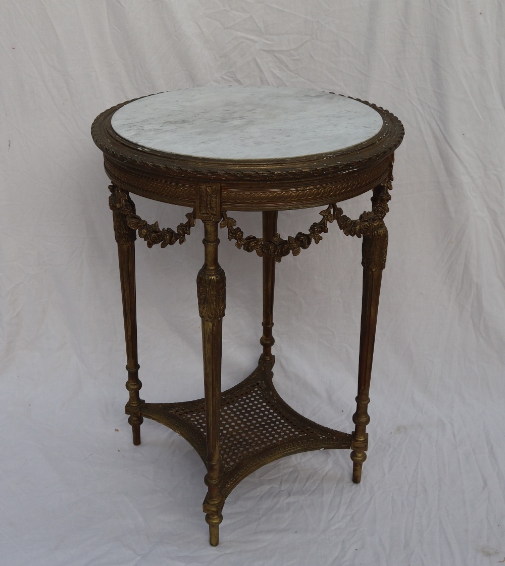 A French gilt decorated and marble topped occasional table,