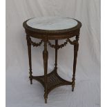 A French gilt decorated and marble topped occasional table,