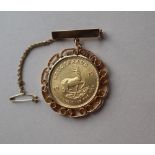A South African gold Krugerrand, dated 1975,