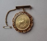 A South African gold Krugerrand, dated 1975,