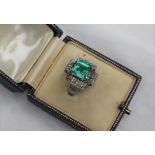 An Emerald and diamond ring,