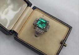 An Emerald and diamond ring,