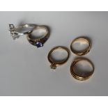 Three 9ct yellow gold semi precious set dress rings together with two silver rings